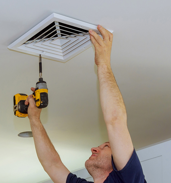 Show Me Air Duct Cleaning technician performing commercial duct cleaning in St. Peters, MO
